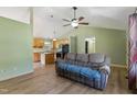 Open-concept living room and kitchen with hardwood floors at 55 Ayden Dr, Clayton, NC 27520