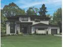 Beautiful two-story house featuring stone accents and large windows, ideal for natural light at 7652 Falls Creek Ln, Raleigh, NC 27614