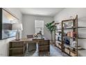 Bright and airy office space with modern desk, shelves, decor, and ample natural light at 600 Sweet Iris Dr, Knightdale, NC 27545