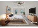 This main bedroom offers natural light, neutral tones, and comfortable furnishings at 3705 Cassaro Ln, Zebulon, NC 27597
