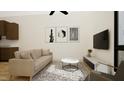 Cozy living room with soft neutral colors, sofa, area rug, and wall mounted tv at 512 Gordon Street # 304, Durham, NC 27701