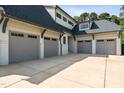 Three car garage, perfect for car enthusiasts, and ample parking for your friends and Gathering at 5125 Avalaire Oaks Dr, Raleigh, NC 27614