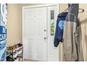 Bright entryway featuring a door to the outside and a closet for coats and shoes at 700 Martin Luther King Jr Blvd # A6, Chapel Hill, NC 27514