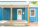 Inviting covered front porch perfect for relaxing or greeting guests at 1402 Robinhood Rd, Durham, NC 27701