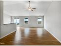 A spacious living room with hardwood floors and ample natural light at 2079 Alderman Way, Creedmoor, NC 27522