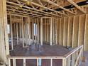 View of the exposed wooden frame construction of an interior living space at 3006 Dog Rose Dr # 308, Durham, NC 27703