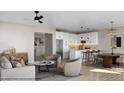 Open-concept living room and kitchen with hardwood floors, stainless steel appliances, and white cabinetry at 1036 Harper Rd, Raleigh, NC 27603