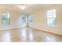 Spacious main bedroom with neutral walls and plenty of natural light at 124 Owensboro Ct, Raleigh, NC 27603
