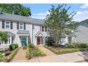 Charming townhome featuring landscaped yard and inviting entrance at 1442 Aversboro Rd # 7, Garner, NC 27529