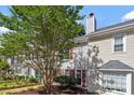 Exterior of charming townhome featuring a landscaped yard at 1442 Aversboro Rd # 7, Garner, NC 27529
