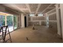 Living room featuring a sliding glass door, recessed lighting and views of the backyard at 188 Landon Ridge, Sanford, NC 27330