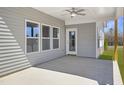 Covered patio featuring a ceiling fan, offering a comfortable outdoor living space at 1931 Ballard Rd, Fuquay Varina, NC 27526
