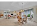 Spacious open-concept living and dining area with lots of natural light and elegant furnishings at 1933 Castle Pines Dr, Raleigh, NC 27604