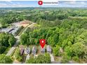 Aerial view showcasing the home's location in a green area near Downtown Durham at 2407 Miriam Cir, Durham, NC 27704