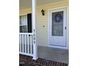 The front door with a decorative wreath and the house number on the side of the porch at 3609 Cold Harbour Dr, Raleigh, NC 27610