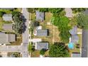 Aerial view of neighborhood homes, showcasing rooftops, driveways, yards and landscaping at 412 W Stallings St, Clayton, NC 27520