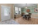 Cozy dining room featuring light green walls, and natural light at 513 Heswall Ct, Rolesville, NC 27571