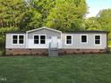 Charming single-story home with a well-maintained lawn and inviting front entrance at 550 Saplin Branch Rd, Timberlake, NC 27583