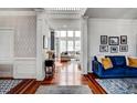 Elegant foyer with hardwood floors, detailed trim, and views into the spacious living areas of the home at 704 Valleywater St, Fuquay Varina, NC 27526