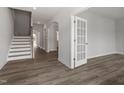 Bright entryway with hardwood floors, stairs and an arched doorway offering an open concept feel at 95 Black Walnut Dr # 191, Garner, NC 27529