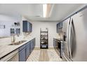 Stylish kitchen features stainless steel appliances, subway tile backsplash, and well designed cabinets at 107 Sturbridge Dr, Clayton, NC 27520