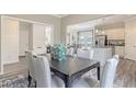 Open dining area with views into the kitchen and back patio, creating a seamless flow at 132 Sagamore Avenue, Angier, NC 27501