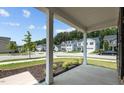 Inviting view from the covered front porch, showcasing the neighborhood and street at 2501 Macedonia Pine Dr, Raleigh, NC 27616