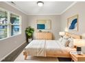 Bright bedroom featuring neutral tones, ample natural light, and modern decor at 664 Lavenham Ln, Fuquay Varina, NC 27526