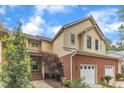 Charming two-story home featuring a brick foundation and attached one-car garage at 11035 Southwalk Ln, Raleigh, NC 27614