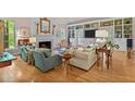 Cozy living room with fireplace, built-in shelving, and hardwood floors at 191 Nc 56, Louisburg, NC 27549