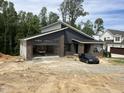 Modern home featuring brick and a 2-car garage at 269 Deer Tail Ln # 44, Fuquay Varina, NC 27526