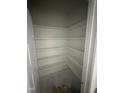 Spacious walk-in pantry with ample shelving for organized storage at 9254 Turkey Way, Middlesex, NC 27557