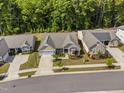 An aerial view showcases the home's landscaped yard, inviting curb appeal and neighborhood setting at 1129 Santa Cruz St, Wake Forest, NC 27587