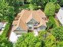 An aerial view of a home with mature trees, manicured hedges and a private backyard at 1225 Fanning Dr, Wake Forest, NC 27587