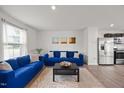 Comfortable living room featuring hardwood floors, and neutral-colored walls at 1303 Bent Willow Dr, Durham, NC 27704