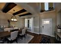 Elegant dining room with wood floors, stylish lighting, and designer touches at 211 George Hudson Rd, Siler City, NC 27344