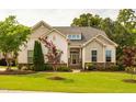 Beautiful single-story house exhibiting lush green lawn and inviting curb appeal at 2910 Reynolda Cir, Durham, NC 27712