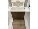 Sample materials showing floorboards, cabinet, tiles, and countertop at 336 White Oak Garden Way # 222, Garner, NC 27529