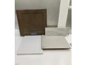 Sample materials showing tiles, cabinet, flooring, and countertop at 336 White Oak Garden Way # 222, Garner, NC 27529