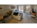 Inviting living room featuring neutral tones, comfortable seating and ample natural light at 3523 Ivy Commons Dr # 102, Raleigh, NC 27606