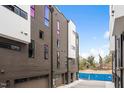An exterior row of modern townhomes with a view of the side facade at 512 Gordon St # 1006, Durham, NC 27701
