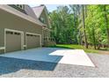 Attached two car garage with paved parking area at 59 Mill Rd, Pittsboro, NC 27312