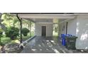 Spacious covered carport with brick columns, providing shelter and extra space at 626 Hoover Rd, Durham, NC 27703