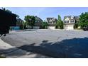Scenic street view showcasing a series of well-kept homes with attached garages under a sunny sky at 306 Mainline Station Dr, Morrisville, NC 27560