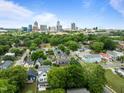 Aerial view of the neighborhood and skyline, showing proximity to the city at 401 Haywood St, Raleigh, NC 27601