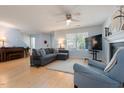 Bright, open-concept living space with hardwood floors, fireplace, and plenty of seating at 504 High Ridge Dr, Durham, NC 27707