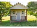 Versatile outbuilding on a grassy lot, offering flexible space for hobbies or storage at 78 Cross Creek Ct, Timberlake, NC 27583