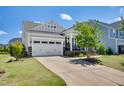 Attractive home with a two-car garage and well-maintained landscaping at 94 Two Creeks, Chapel Hill, NC 27517