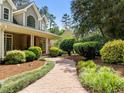 Home exterior featuring well-manicured front yard and stone walkway at 74002 Harvey, Chapel Hill, NC 27517