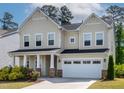 Charming two-story home with well-manicured landscaping and a spacious two car garage at 108 Valley View Dr, Chapel Hill, NC 27516